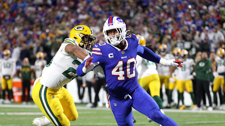 The Bills' Von Miller rushes around the end against the Packers.