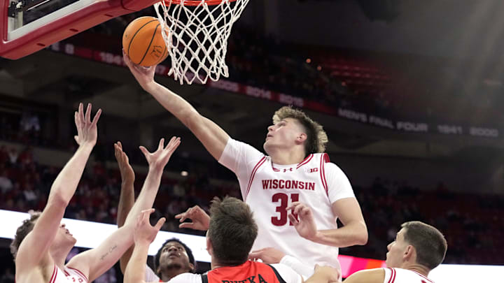 Wisconsin forward Nolan Winter (31) grabs a rebound during the first half of their game against Campbell Monday, November 3, 2025 at the Kohl Center in Madison, Wisconsin.