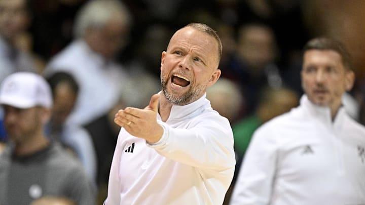 Feb 17, 2026; Dallas, Texas, USA; Louisville Cardinals head coach Pat Kelsey reacts to a call during the second half against the SMU Mustangs at Moody Coliseum. Mandatory Credit: Jerome Miron-Imagn Images