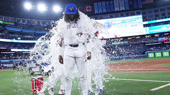 Aug 10, 2026; Toronto, Ontario, CAN; Toronto Blue Jays third baseman Charles McAdoo (26) has the water bucket poured on him against the Boston Red Sox at the end of the ninth inning against the Boston Red Sox Mandatory Credit: Nick Turchiaro-Imagn Images Aug 10, 2026; Toronto, Ontario, CAN; Toronto Blue Jays third baseman Charles McAdoo (26) has the water bucket poured on him against the Boston Red Sox at the end of the ninth inning against the Boston Red Sox Mandatory Credit: Nick Turchiaro-Imagn Images