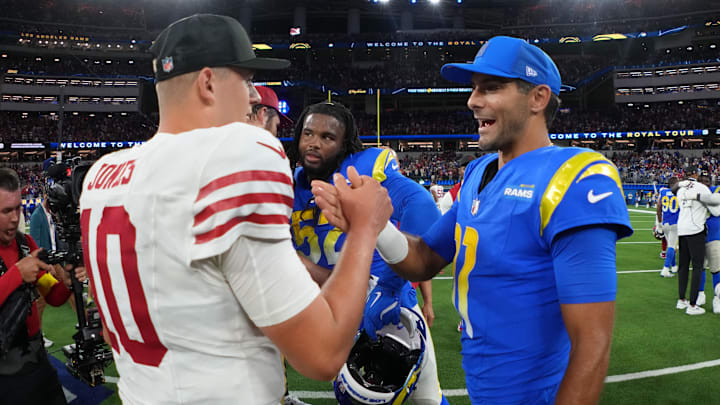 Oct 2, 2025; Inglewood, California, USA; San Francisco 49ers quarterback Mac Jones (10) reacts with Los Angeles Rams quarterback Jimmy Garoppolo (11) after the game against the Los Angeles Rams at SoFi Stadium. Mandatory Credit: Kirby Lee-Imagn Images Oct 2, 2025; Inglewood, California, USA; San Francisco 49ers quarterback Mac Jones (10) reacts with Los Angeles Rams quarterback Jimmy Garoppolo (11) after the game against the Los Angeles Rams at SoFi Stadium. Mandatory Credit: Kirby Lee-Imagn Images
