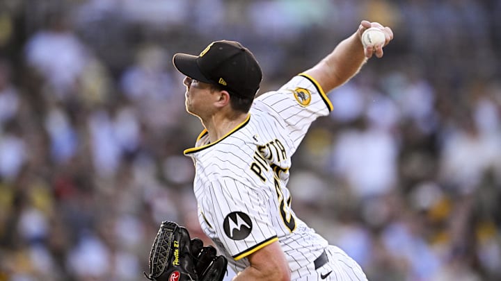 Sep 10, 2025; San Diego, California, USA; San Diego Padres starting pitcher Nick Pivetta (27) delivers during the fourth inning against the Cincinnati Reds at Petco Park. Mandatory Credit: Denis Poroy-Imagn Images