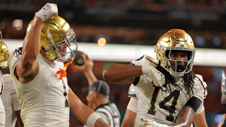 Aug 31, 2025; Miami Gardens, Florida, USA; Notre Dame Fighting Irish wide receiver Micah Gilbert (14) reacts after scoring a touchdown against the Miami Hurricanes during the second quarter at Hard Rock Stadium. Mandatory Credit: Sam Navarro-Imagn Images