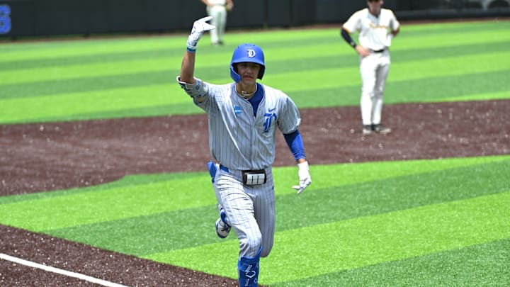 Jun 8, 2025; Durham, NC, USA; Duke Blue Devils outfielder AJ Gracia (29) celebrates a run home in the first inning against the Murray State at Racers Durham Super Regionals at Jack Coombs Field. Mandatory Credit: Zachary Taft-Imagn Images