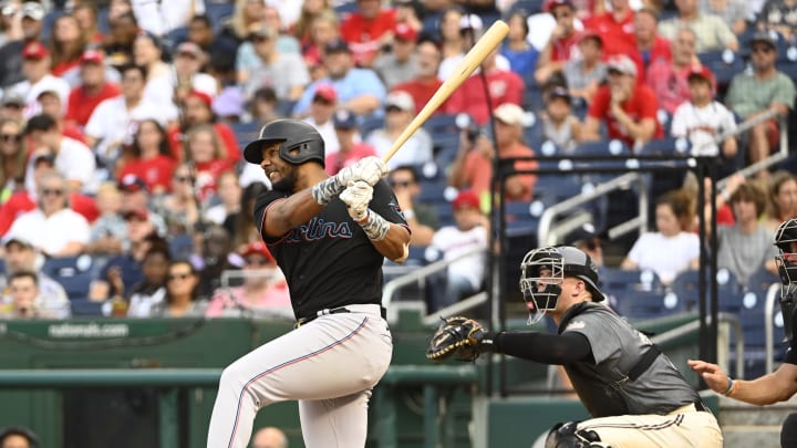 Sep 17, 2022; Washington, District of Columbia, USA; Miami Marlins left fielder Jerar Encarnacion (64) hits a two run home run against the Washington Nationals during the fourth inning at Nationals Park. Sep 17, 2022; Washington, District of Columbia, USA; Miami Marlins left fielder Jerar Encarnacion (64) hits a two run home run against the Washington Nationals during the fourth inning at Nationals Park.