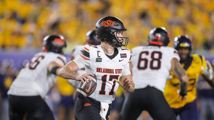 Sep 26, 2026; Morgantown, West Virginia, USA; Oklahoma State Cowboys quarterback Drew Mestemaker (17) rolls out for a pass during the fourth quarter against the West Virginia Mountaineers at Milan Puskar Stadium. Mandatory Credit: Ben Queen-Imagn Images Sep 26, 2026; Morgantown, West Virginia, USA; Oklahoma State Cowboys quarterback Drew Mestemaker (17) rolls out for a pass during the fourth quarter against the West Virginia Mountaineers at Milan Puskar Stadium. Mandatory Credit: Ben Queen-Imagn Images