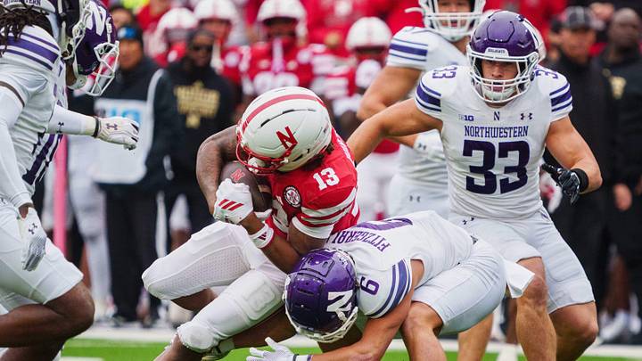 Northwestern Wildcats defensive back Robert Fitzgerald (6) and linebacker Braydon Brus (33) during the first quarter at Memorial Stadium. Mandatory Credit: Dylan Widger-Imagn Images Northwestern Wildcats defensive back Robert Fitzgerald (6) and linebacker Braydon Brus (33) during the first quarter at Memorial Stadium. Mandatory Credit: Dylan Widger-Imagn Images
