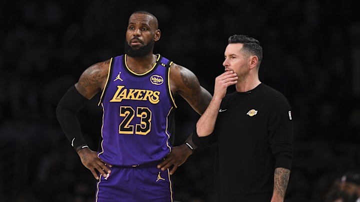 Oct 25, 2024; Los Angeles, California, USA; Los Angeles Lakers forward LeBron James (23) with Los Angeles Lakers head coach JJ Redick against the Phoenix Suns during the first half at Crypto.com Arena. Mandatory Credit: Jonathan Hui-Imagn Images