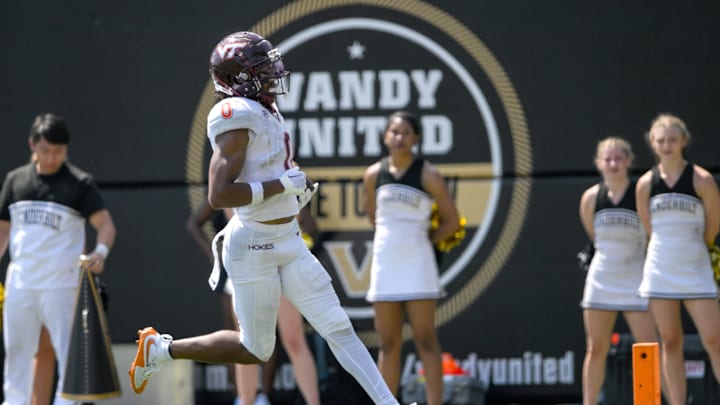 Aug 31, 2024; Nashville, Tennessee, USA; Virginia Tech Hokies wide receiver Ali Jennings (0) scores off of a broken play against the Vanderbilt Commodores during the second half at FirstBank Stadium. Mandatory Credit: Steve Roberts-Imagn Images Aug 31, 2024; Nashville, Tennessee, USA; Virginia Tech Hokies wide receiver Ali Jennings (0) scores off of a broken play against the Vanderbilt Commodores during the second half at FirstBank Stadium. Mandatory Credit: Steve Roberts-Imagn Images