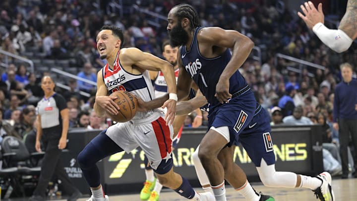 Mar 1, 2024; Los Angeles, California, USA; Los Angeles Clippers guard James Harden (1) knocks the ball from Washington Wizards guard Landry Shamet (20) as he drives to the basket in the second half at Crypto.com Arena. Mar 1, 2024; Los Angeles, California, USA; Los Angeles Clippers guard James Harden (1) knocks the ball from Washington Wizards guard Landry Shamet (20) as he drives to the basket in the second half at Crypto.com Arena.