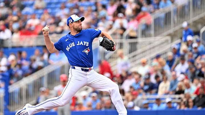 Feb 25, 2025; Dunedin, Florida, USA; Toronto Blue Jays starting pitcher Max Scherzer (31) throws against the St. Louis Cardinals in the first inning of a spring training game at TD Ballpark. 