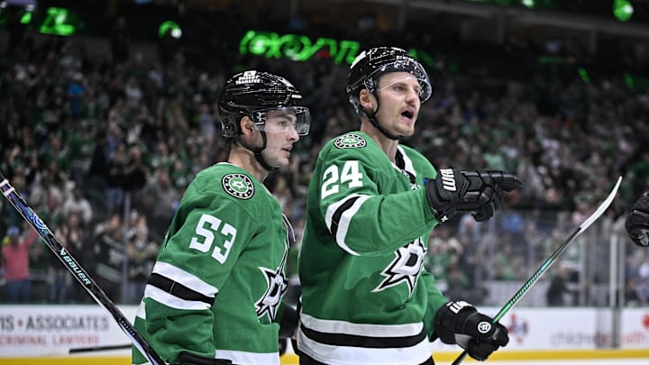 Oct 15, 2024; Dallas, Texas, USA; Dallas Stars center Wyatt Johnston (53) and center Roope Hintz (24) celebrates a goal scored by Hintz against the San Jose Sharks during the second period at the American Airlines Center. Mandatory Credit: Jerome Miron-Imagn Images
