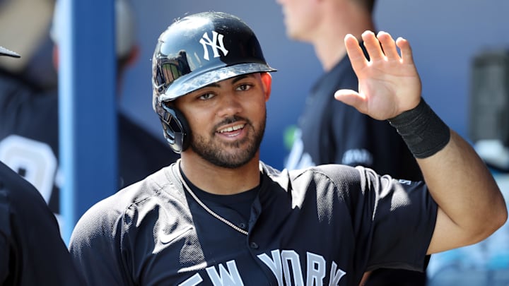 New York Yankees outfielder Jasson Dominguez (24) scores a run during the third inning against the Tampa Bay Rays at Charlotte Sports Park. 