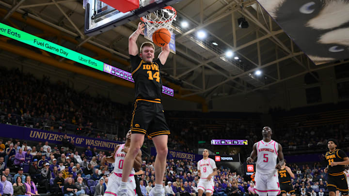Feb 4, 2026; Seattle, Washington, USA; Iowa Hawkeyes guard Bennett Stirtz (14) dunks the ball against the Washington Huskies during the second half at Alaska Airlines Arena at Hec Edmundson Pavilion. Mandatory Credit: Steven Bisig-Imagn Images Feb 4, 2026; Seattle, Washington, USA; Iowa Hawkeyes guard Bennett Stirtz (14) dunks the ball against the Washington Huskies during the second half at Alaska Airlines Arena at Hec Edmundson Pavilion. Mandatory Credit: Steven Bisig-Imagn Images