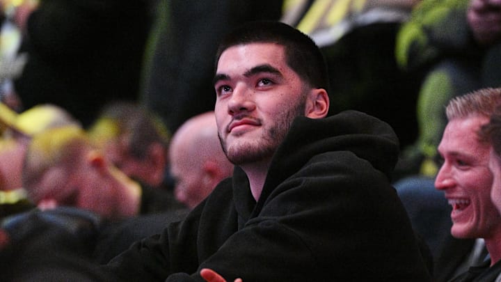 Feb 17, 2026; West Lafayette, Indiana, USA; Former Purdue Boilermaker Zach Edey sits in the crowd during the game against the Michigan Wolverines at Mackey Arena. Mandatory Credit: Marc Lebryk-Imagn Images