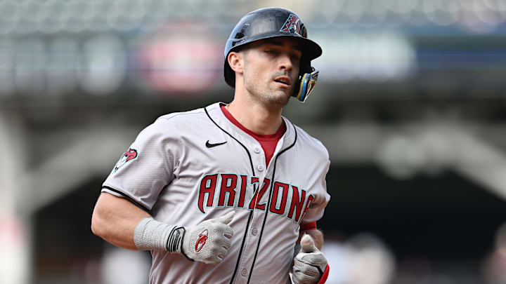 Aug 7, 2024; Cleveland, Ohio, USA; Arizona Diamondbacks left fielder Randal Grichuk (15) rounds the bases after hitting a home run during the seventh inning against the Cleveland Guardians at Progressive Field. Mandatory Credit: Ken Blaze-Imagn Images
