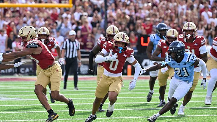 September 19, 2026; Chestnut Hill, Massachusetts, USA; Boston College Eagles defensive back TJ Green (0) runs the ball against Maine Black Bears defensive back Erv Wiggins Jr. (21) during the first half at Alumni Stadium. Mandatory Credit: Eric Canha-Imagn Images September 19, 2026; Chestnut Hill, Massachusetts, USA; Boston College Eagles defensive back TJ Green (0) runs the ball against Maine Black Bears defensive back Erv Wiggins Jr. (21) during the first half at Alumni Stadium. Mandatory Credit: Eric Canha-Imagn Images