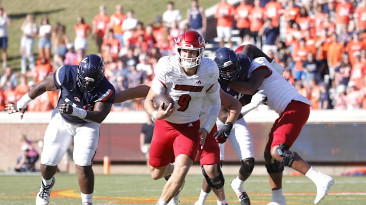 Oct 12, 2024; Charlottesville, Virginia, USA; Louisville Cardinals quarterback Tyler Shough (9) carries the ball during the first half against the Virginia Cavaliers at Scott Stadium. Mandatory Credit: Amber Searls-Imagn Images