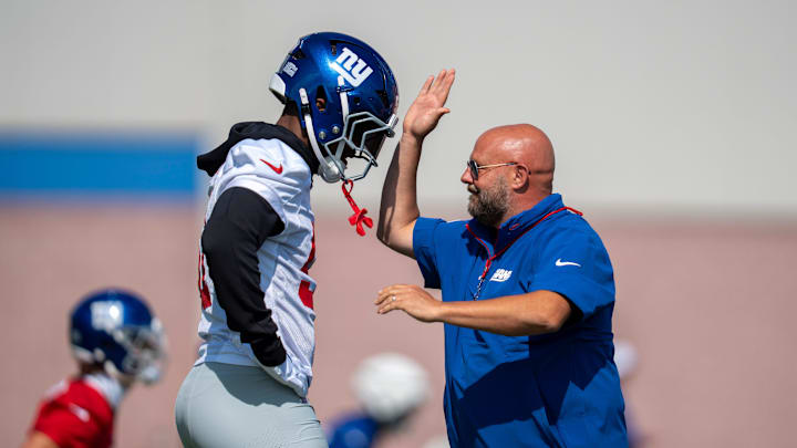 New York Giants Head Coach Brian Daboll speaks with New York Giants linebacker Abdul Carter (51) during day one of the New York Giants training camp at Quest Diagnostics Giants Training Center in East Rutherford on Wednesday, July 23, 2025.