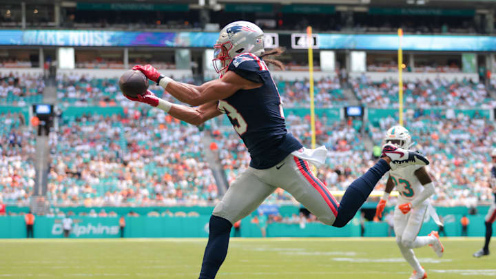 New England Patriots wide receiver Mack Hollins (13) catches the football for a touchdown against the Miami Dolphins during the first quarter at Hard Rock Stadium.