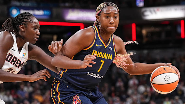 Indiana Fever forward Aliyah Boston (7) rushes up the court against Atlanta Dream center Tina Charles (31) on Thursday, May 9, 2024, during the preseason game against the Atlanta Dream at Gainbridge Fieldhouse in Indianapolis.