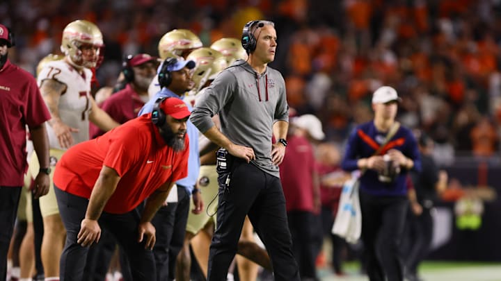 Oct 26, 2024; Miami Gardens, Florida, USA; Florida State Seminoles head coach Mike Norvell watches from the sideline against the Miami Hurricanes during the second quarter at Hard Rock Stadium. Mandatory Credit: Sam Navarro-Imagn Images