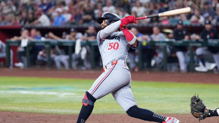 Minnesota Twins shortstop Willi Castro (50) hits a two-run home run against the Arizona Diamondbacks during the fifth inning at Chase Field in Phoenix on June 26, 2024.