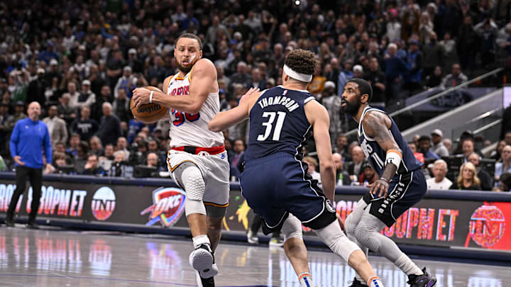 Feb 12, 2025; Dallas, Texas, USA; Golden State Warriors guard Stephen Curry (30) and Dallas Mavericks guard Klay Thompson (31) in action during the game between the Dallas Mavericks and the Golden State Warriors at the American Airlines Center. Mandatory Credit: Jerome Miron-Imagn Images