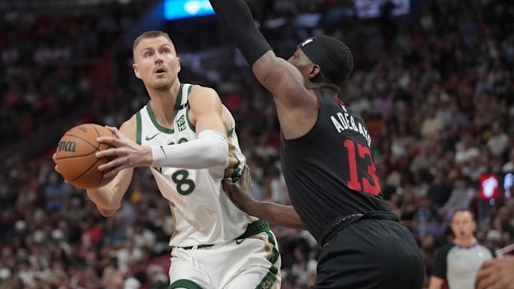 Feb 11, 2024; Miami, Florida, USA;  Boston Celtics center Kristaps Porzingis (8) goes up for a shot vs. the Miami Heat.