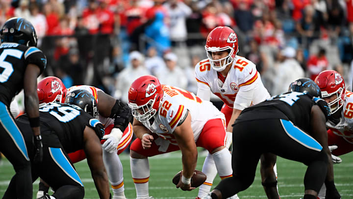 Nov 24, 2024; Charlotte, North Carolina, USA; Kansas City Chiefs center Creed Humphrey (52) hikes the ball to quarterback Patrick Mahomes (15) in the fourth quarter at Bank of America Stadium. Mandatory Credit: Bob Donnan-Imagn Images