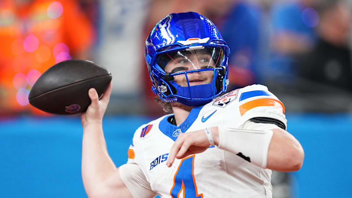 Boise State Broncos quarterback Maddux Madsen (4) practices before the Fiesta Bowl against the Penn State Nittany Lions at State Farm Stadium. 