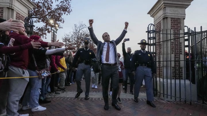 Nov 25, 2023; Columbia, South Carolina, USA; South Carolina Gamecocks head coach Shane Beamer leads the Gamecock Walk prior to their game against the Clemson Tigers at Williams-Brice Stadium. Mandatory Credit: David Yeazell-USA TODAY Sports Nov 25, 2023; Columbia, South Carolina, USA; South Carolina Gamecocks head coach Shane Beamer leads the Gamecock Walk prior to their game against the Clemson Tigers at Williams-Brice Stadium. Mandatory Credit: David Yeazell-USA TODAY Sports