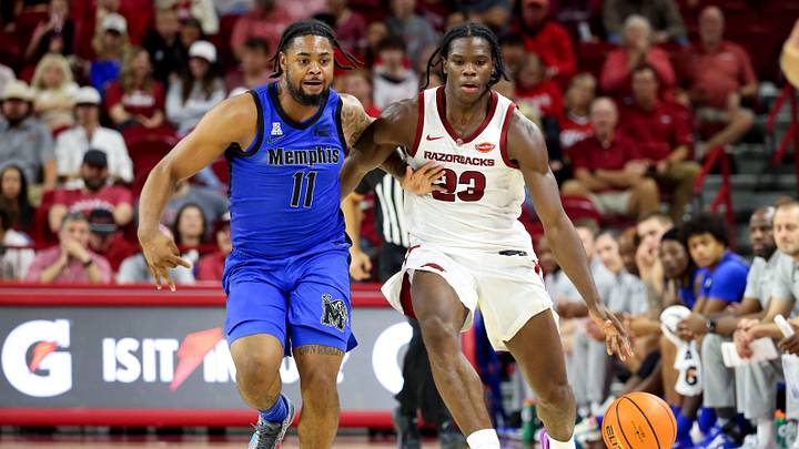 Oct 28, 2026; Fayetteville, Arkansas, USA; Arkansas Razorbacks guard Jordan Smith Jr (23) drives against Memphis Tigers guard Cello Jackson Jr (11) during the second half at Bud Walton Arena. Mandatory Credit: Nelson Chenault-Imagn Images Oct 28, 2026; Fayetteville, Arkansas, USA; Arkansas Razorbacks guard Jordan Smith Jr (23) drives against Memphis Tigers guard Cello Jackson Jr (11) during the second half at Bud Walton Arena. Mandatory Credit: Nelson Chenault-Imagn Images