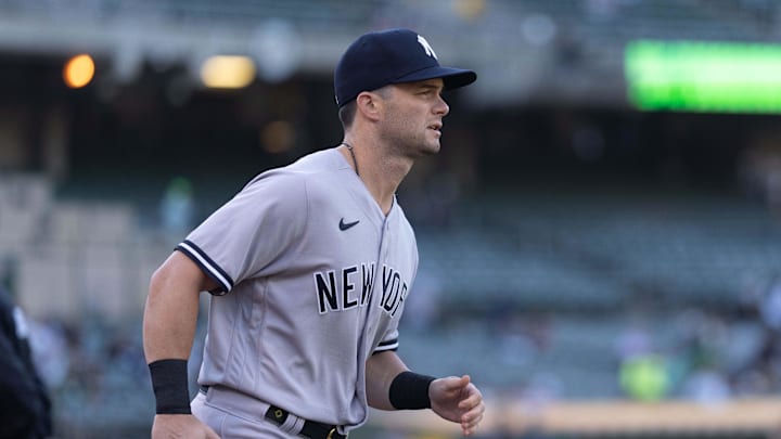 Aug 25, 2022; Oakland, California, USA;  New York Yankees left fielder Andrew Benintendi (18) jogs