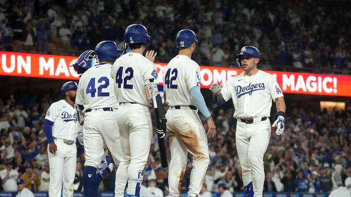 Apr 15, 2026; Los Angeles, California, USA; Los Angeles Dodgers catcher Dalton Rushing (right) celebrates with center fielder Andy Pages (second from right), Hyeseong Kim (second from left) and Max Mundy, all wearing No. 42 in honor of Jackie Robinson day, after hitting a grand slam home run in the eighth inning against the New York Mets at Dodger Stadium. Mandatory Credit: Kirby Lee-Imagn Images Apr 15, 2026; Los Angeles, California, USA; Los Angeles Dodgers catcher Dalton Rushing (right) celebrates with center fielder Andy Pages (second from right), Hyeseong Kim (second from left) and Max Mundy, all wearing No. 42 in honor of Jackie Robinson day, after hitting a grand slam home run in the eighth inning against the New York Mets at Dodger Stadium. Mandatory Credit: Kirby Lee-Imagn Images