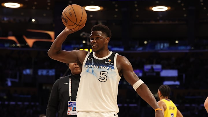 Feb 27, 2025; Los Angeles, California, USA; Minnesota Timberwolves guard Anthony Edwards (5) reacts after being ejected during the third quarter against the Los Angeles Lakers at Crypto.com Arena. Mandatory Credit: Jason Parkhurst-Imagn Images