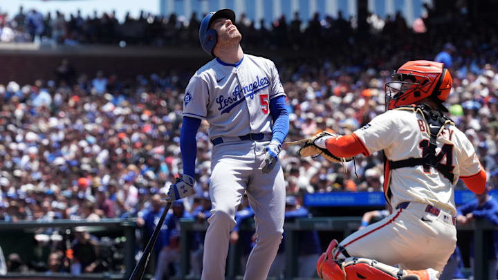 Jul 12, 2025; San Francisco, California, USA; Los Angeles Dodgers first baseman Freddie Freeman (5) reacts after a called strike three against the San Francisco Giants during the third inning at Oracle Park. Mandatory Credit: Darren Yamashita-Imagn Images