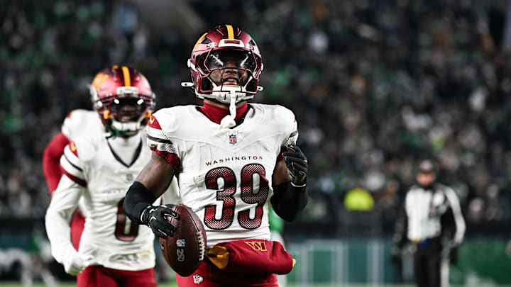 Washington Commanders safety Jeremy Reaves celebrates an interception against the Philadelphia Eagles