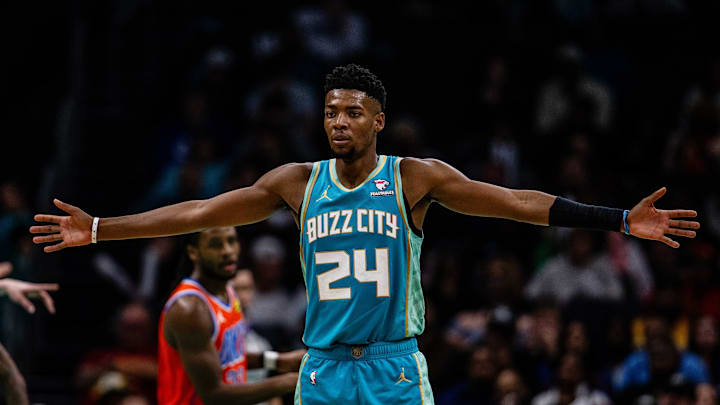 Apr 7, 2024; Charlotte, North Carolina, USA; Charlotte Hornets forward Brandon Miller (24) sets up on defense against the Oklahoma City Thunder at Spectrum Center. Mandatory Credit: Scott Kinser-USA TODAY Sports