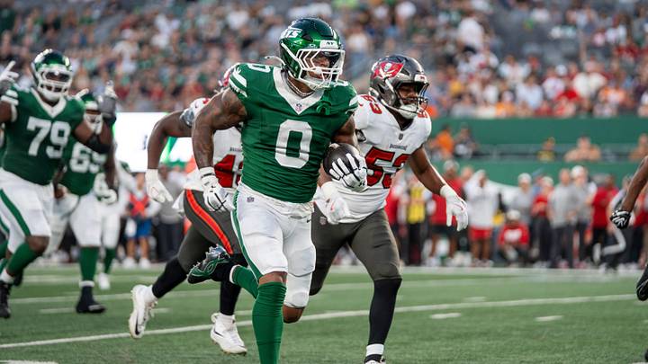 New York Jets running back Braelon Allen (0) runs the ball for a touchdown during a preseason opening game between the New York Jets and Tampa Bay Buccaneers on Friday, Aug. 14, 2026, at MetLife Stadium in East Rutherford, NJ.