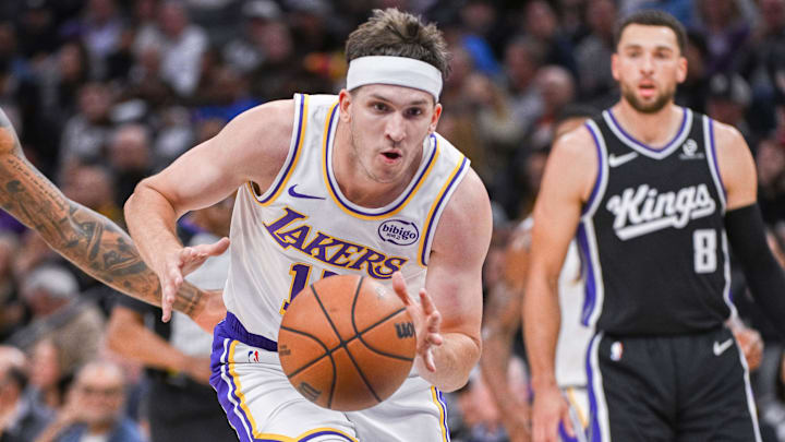 Oct 26, 2025; Sacramento, California, USA; Los Angeles Lakers guard Austin Reaves (15) drives to the basket during the second quarter against the Sacramento Kings at Golden 1 Center. Mandatory Credit: Ed Szczepanski-Imagn Images