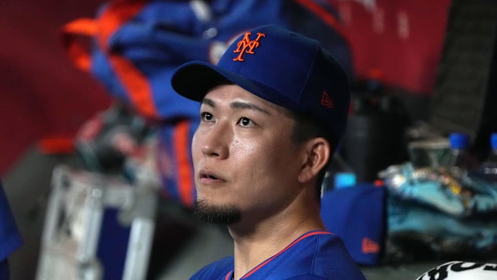 May 7, 2025; Phoenix, Arizona, USA; New York Mets pitcher Kodai Senga (34) sits in the dugout against the Arizona Diamondbacks in the first inning at Chase Field. Mandatory Credit: Rick Scuteri-Imagn Images