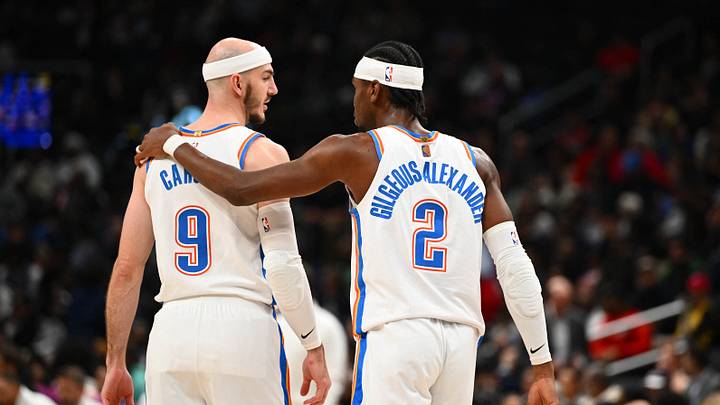 Mar 21, 2026; Washington, District of Columbia, USA; Oklahoma City Thunder guard Shai Gilgeous-Alexander (2) talks with guard Alex Caruso (9) against the Washington Wizards during the first half at Capital One Arena. Mandatory Credit: Brad Mills-Imagn Images Mar 21, 2026; Washington, District of Columbia, USA; Oklahoma City Thunder guard Shai Gilgeous-Alexander (2) talks with guard Alex Caruso (9) against the Washington Wizards during the first half at Capital One Arena. Mandatory Credit: Brad Mills-Imagn Images
