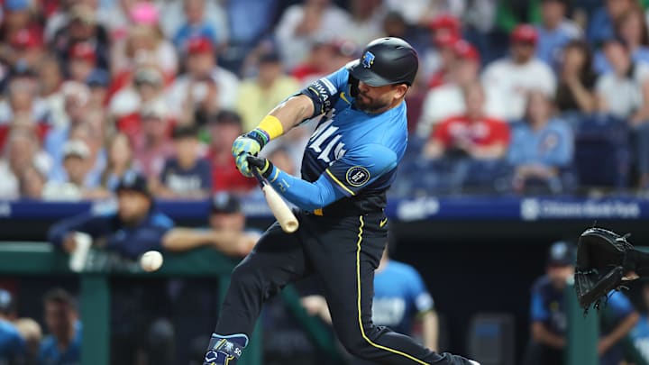 Sep 26, 2025; Philadelphia, Pennsylvania, USA; Philadelphia Phillies outfielder Kyle Schwarber (12) hits an infield single during the first inning against the Minnesota Twins at Citizens Bank Park. Mandatory Credit: Bill Streicher-Imagn Images