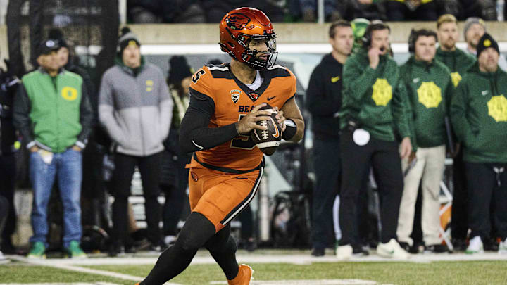 Nov 24, 2023; Eugene, Oregon, USA; Oregon State Beavers quarterback DJ Uiagalelei (5) rolls out to