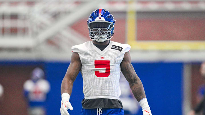 Jun 18, 2025; East Rutherford, NJ, USA; New York Giants linebacker Kayvon Thibodeaux (5) warms up during minicamp at Quest Diagnostics Training Center.  