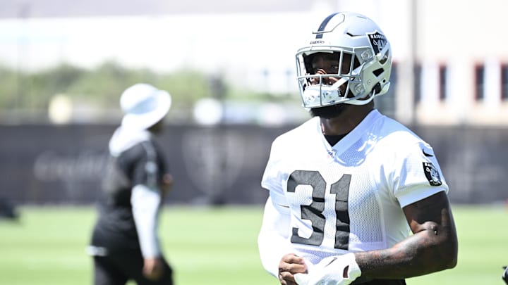 Jun 10, 2025; Henderson, NV, USA; Las Vegas Raiders running back Raheem Mostert (31) prepares for a drill during Las Vegas Raiders Minicamp at Intermountain Health Performance Center. Mandatory Credit: Candice Ward-Imagn Images Jun 10, 2025; Henderson, NV, USA; Las Vegas Raiders running back Raheem Mostert (31) prepares for a drill during Las Vegas Raiders Minicamp at Intermountain Health Performance Center. Mandatory Credit: Candice Ward-Imagn Images