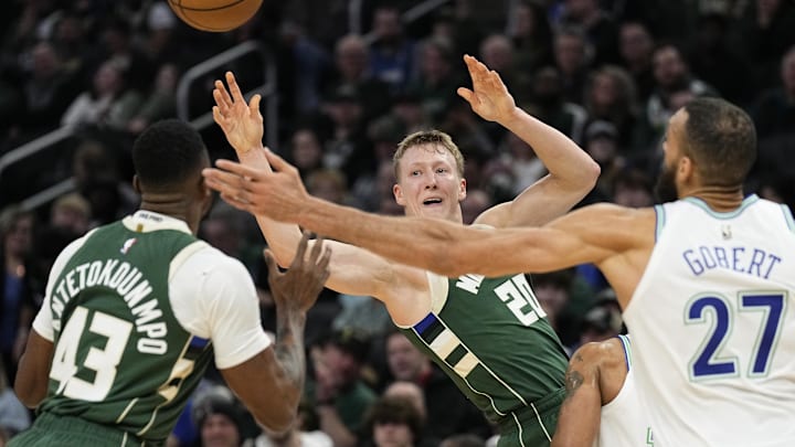 Feb 8, 2024; Milwaukee, Wisconsin, USA; Milwaukee Bucks guard AJ Green (20) passes the ball towards forward Thanasis Antetokounmpo (43) during the fourth quarter against the Minnesota Timberwolves at Fiserv Forum. Mandatory Credit: Jeff Hanisch-Imagn Images Feb 8, 2024; Milwaukee, Wisconsin, USA; Milwaukee Bucks guard AJ Green (20) passes the ball towards forward Thanasis Antetokounmpo (43) during the fourth quarter against the Minnesota Timberwolves at Fiserv Forum. Mandatory Credit: Jeff Hanisch-Imagn Images