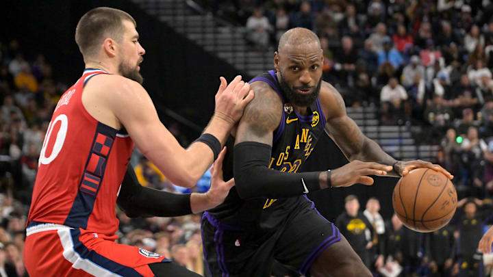 Jan 22, 2026; Inglewood, California, USA;  Los Angeles Clippers center Ivica Zubac (40) defends Los Angeles Lakers forward LeBron James (23) as he drives to the basket in the second half at Intuit Dome. Mandatory Credit: Jayne Kamin-Oncea-Imagn Images