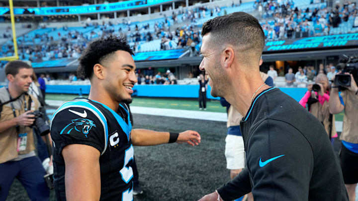 Nov 3, 2024; Charlotte, North Carolina, USA; Carolina Panthers quarterback Bryce Young (9) with head coach Dave Canales after the game at Bank of America Stadium. Mandatory Credit: Bob Donnan-Imagn Images Nov 3, 2024; Charlotte, North Carolina, USA; Carolina Panthers quarterback Bryce Young (9) with head coach Dave Canales after the game at Bank of America Stadium. Mandatory Credit: Bob Donnan-Imagn Images